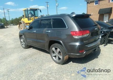 2014 Jeep Grand Cherokee Overland z USA, uszkodzony, nr VIN 1C4RJFCG6EC570431